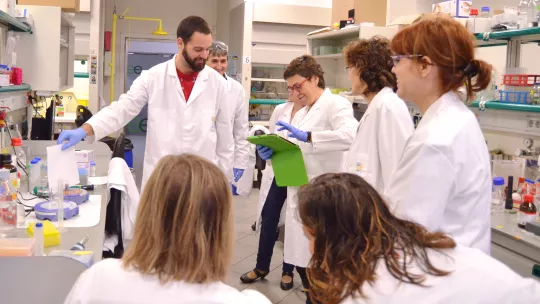 Teachers and scientists working together. 