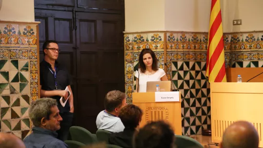 Fanni Gergely answering questions at the conference