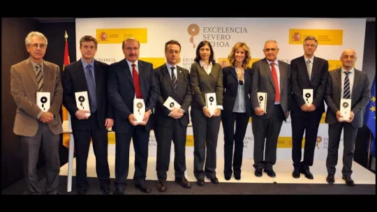 The directors of the eight centers distinguished